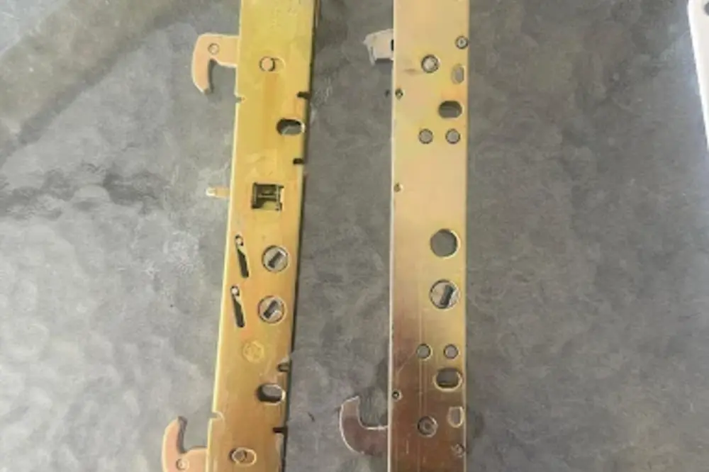 Old and replacement sliding door lock mechanisms compared